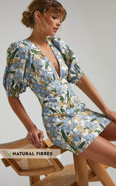 Amalie The Label - Indrisia Linen Puff Sleeve Open Back Bodycon Mini Linen Dress in Iris Floral