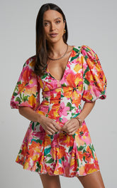 Shairah Mini Dress - V Neck Puff Sleeve Flutter Hem Dress in In Bloom
